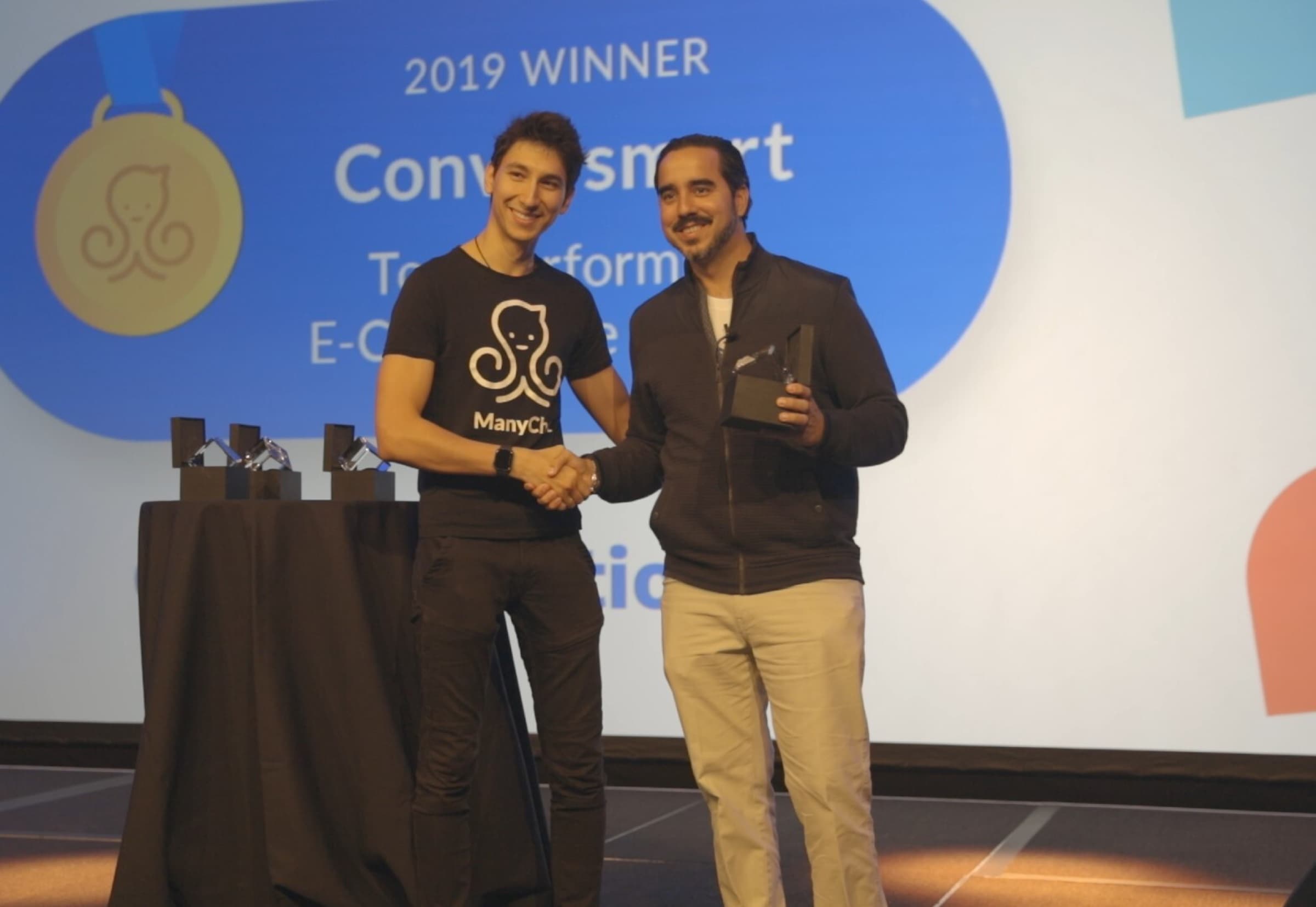 Manuel Suarez on stage receiving the ManyChat 2019 Winner award